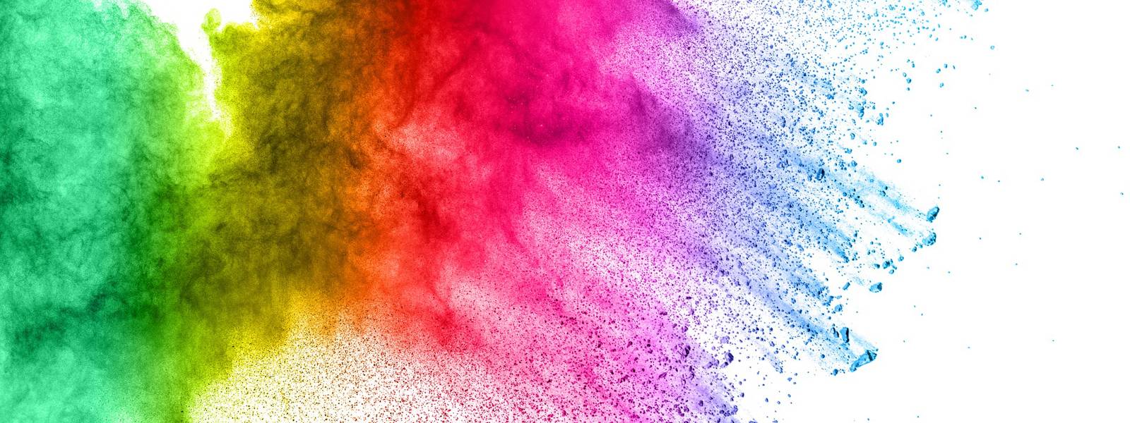 Vibrant powder explosion in green, yellow, red, and blue against a white background.